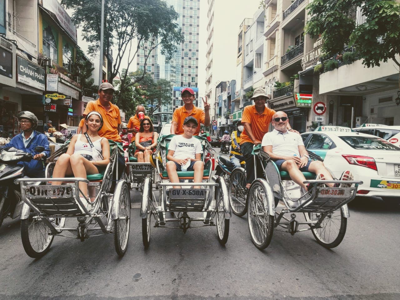 riding rick shaw in saigon