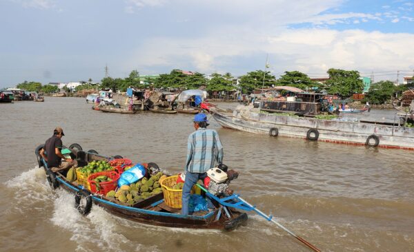 Fruit boat in Cai Be floating market