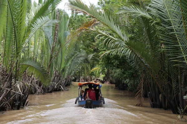 Private boat in coconut river