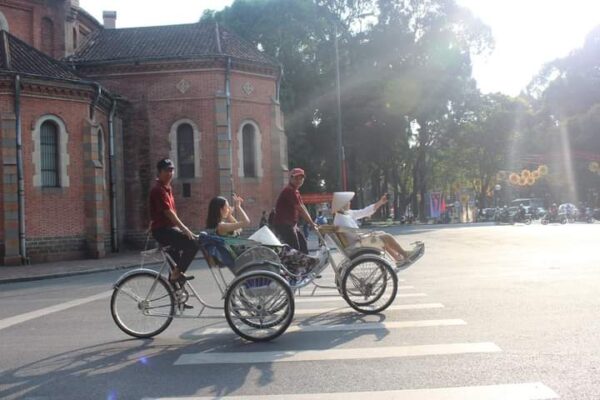 Riding rickshaw in HCM city